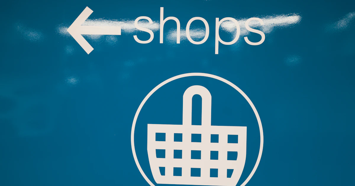 Icona di shopping digitale su sfondo blu, simbolo dell'agentic commerce